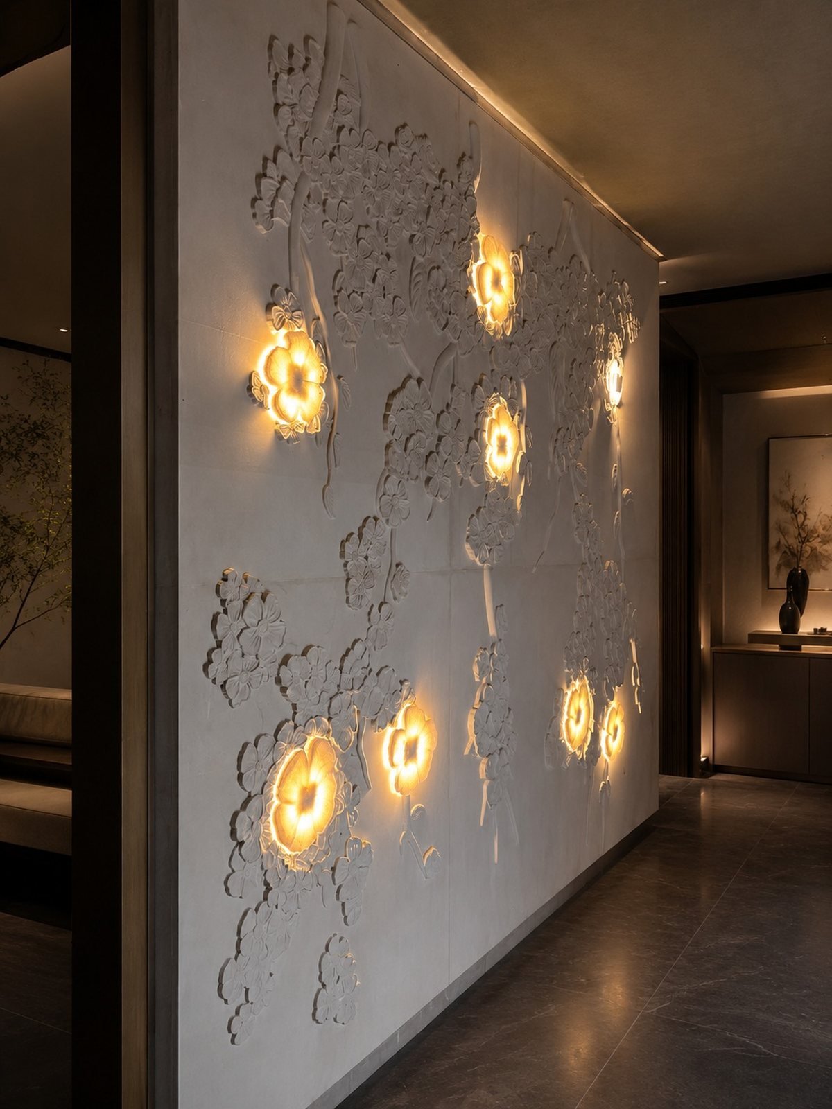 Blossom wall — carved in marble, backlit