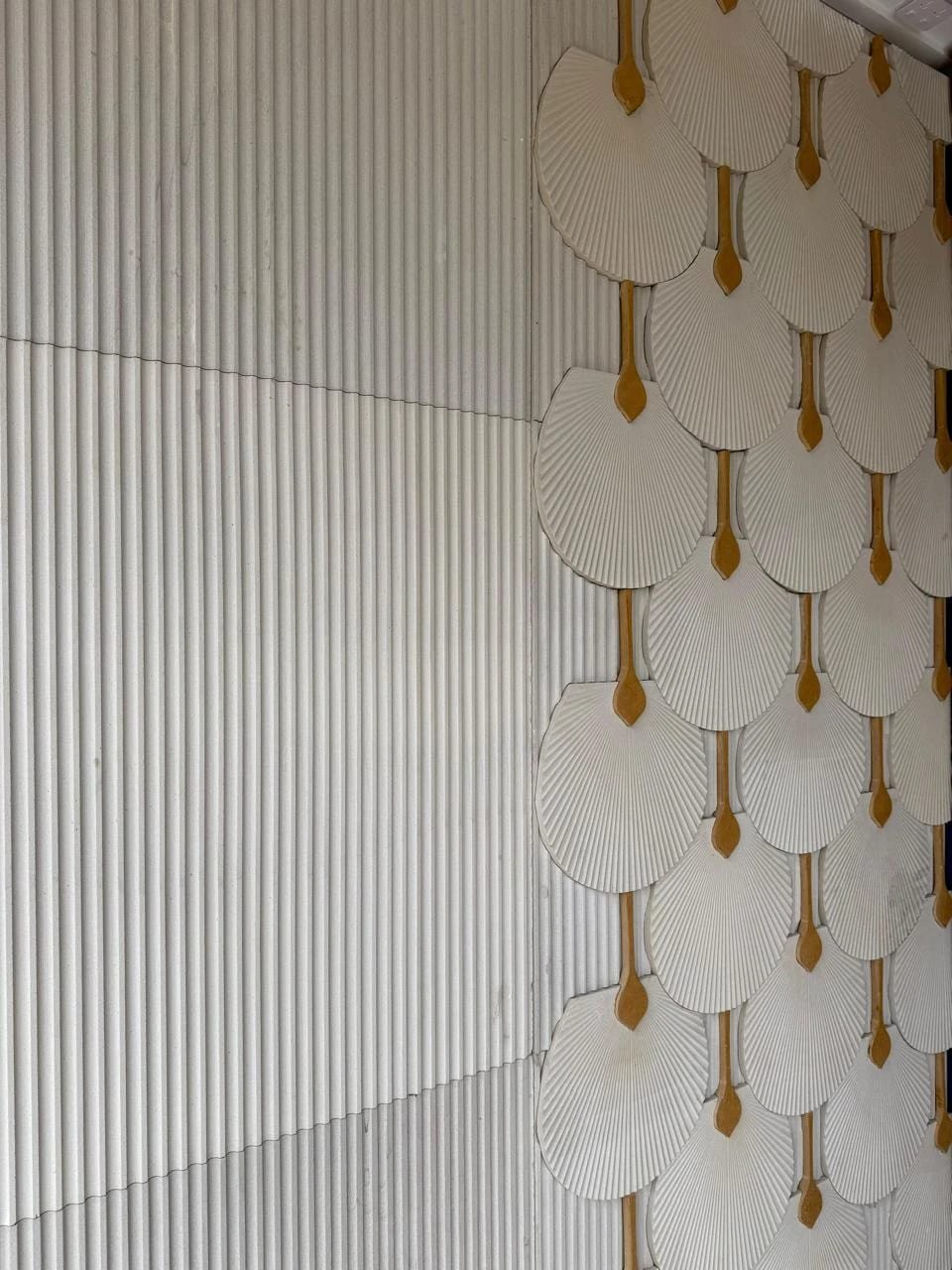Hand-finished white marble and brass fan relief wall by Stonegraph
