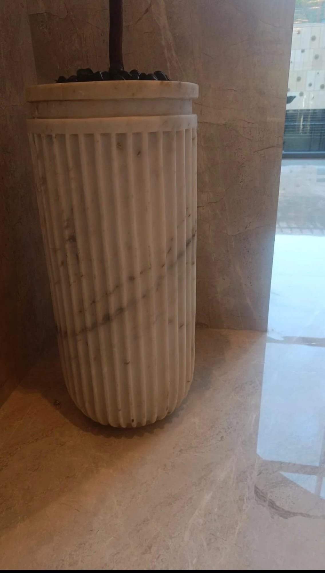 Fluted umbrella stand — carved in carrara marble
