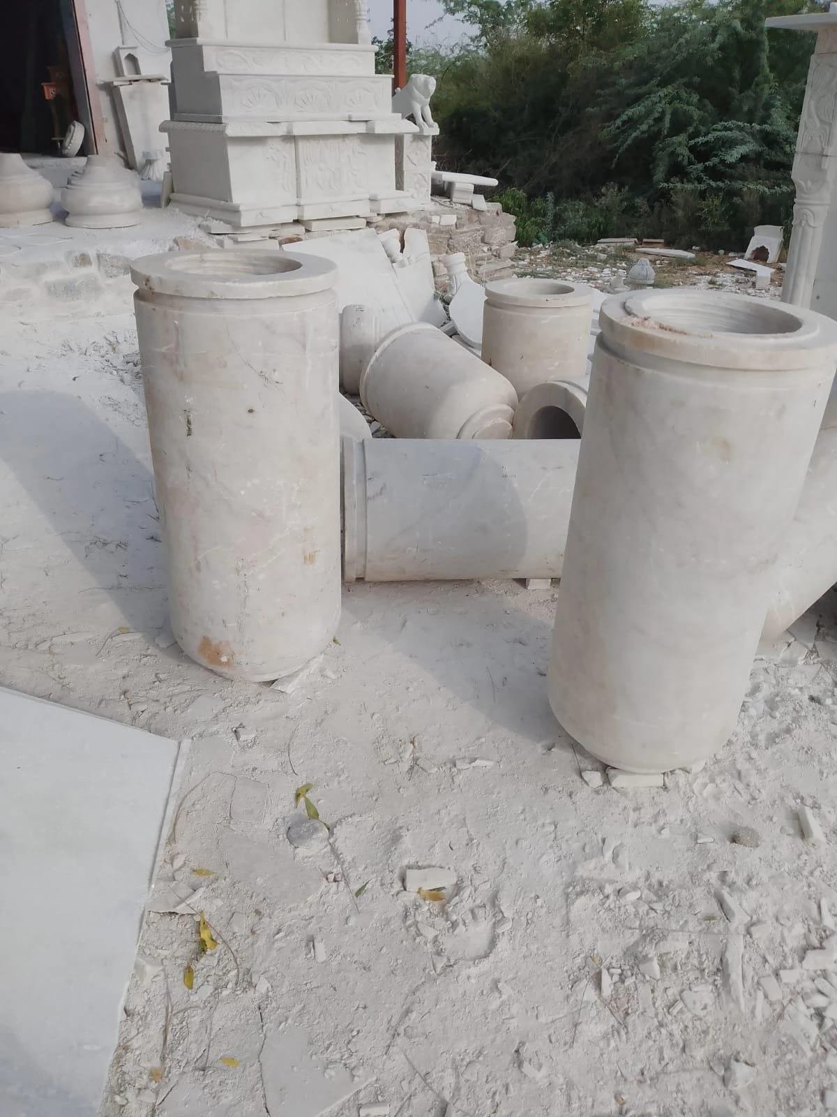 Cylinder planters — carved in white marble