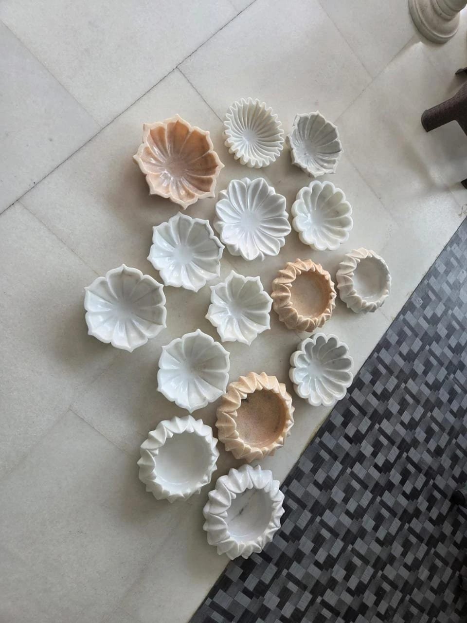 Set of petal-cut white and pink marble urli lotus bowls