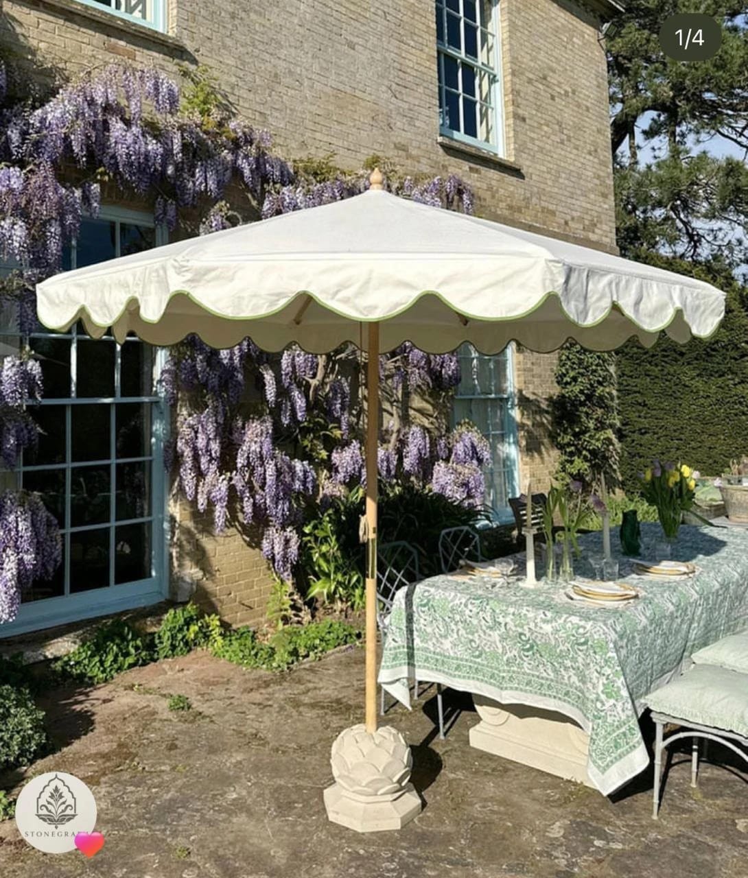 Lotus base under wisteria — carved in sandstone base