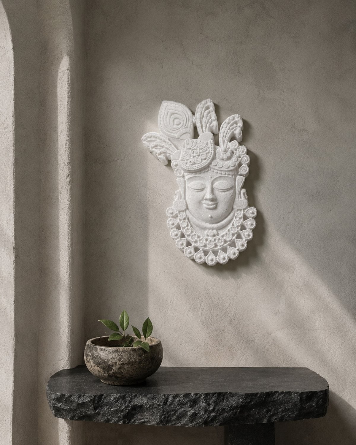 Mukharvind — carved in white marble